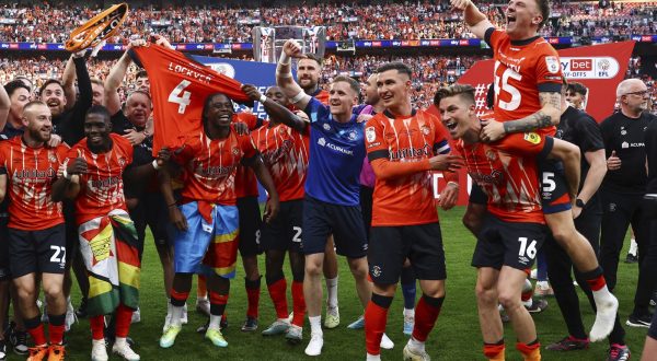 May 27, 2023, London: London, England, 27th May 2023. Luton's players celebrate at the final whistle during the Sky Bet Championship match at Wembley Stadium, London. (Credit Image: Â© David Klein/Sportimage/Cal Sport Media) (Cal Sport Media via AP Images)