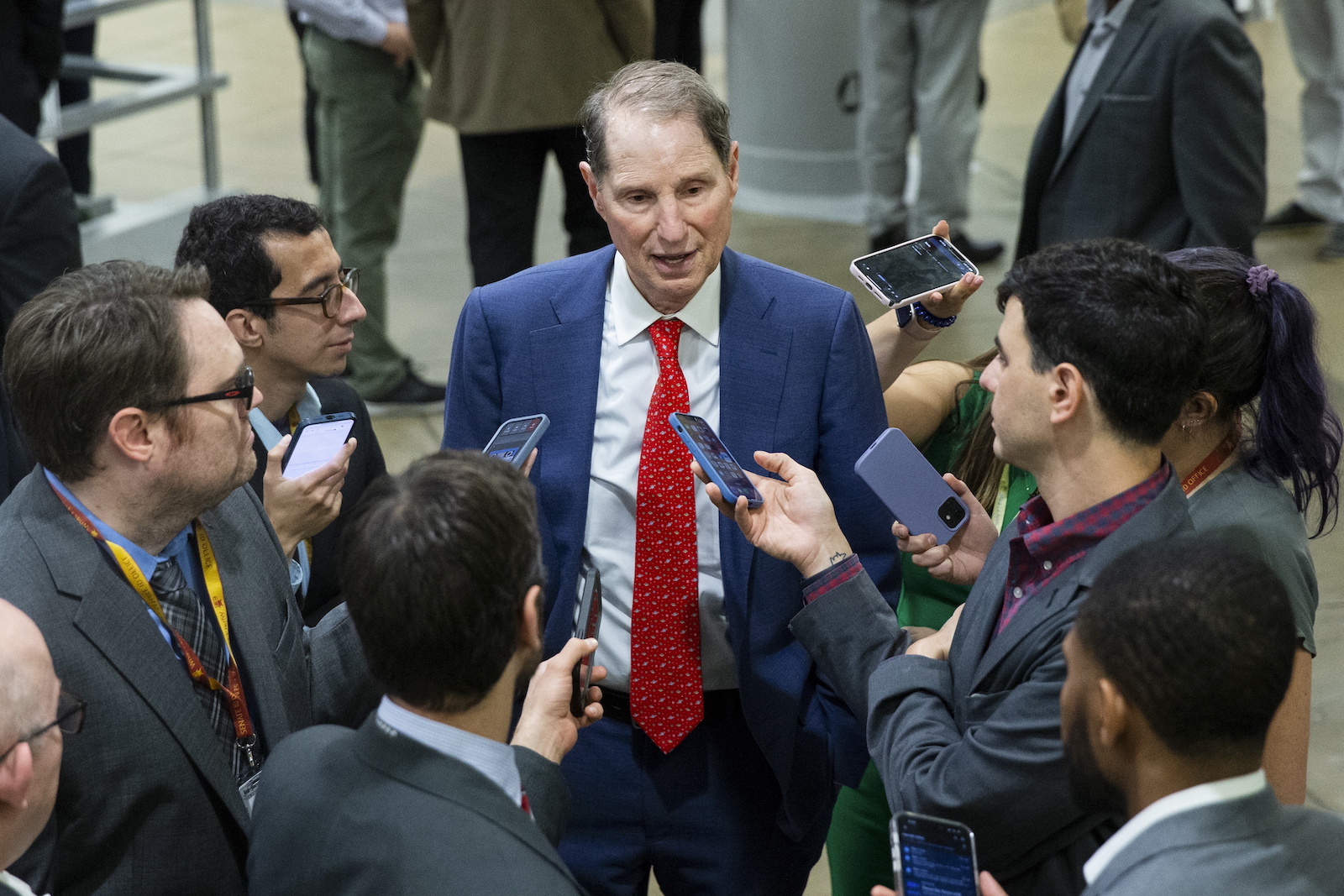 epa10667512 US Democratic Senator of Oregon, Ron Wyden, (C) speaks to members of the media near the Senate subway during Senate voting on Capitol Hill in Washington, DC, USA, 01 June 2023. Bipartisan legislation to raise the debt ceiling and avert a default has passed the House of Representatives but must pass the Senate to land on President Biden's desk for signing.  EPA/MICHAEL REYNOLDS