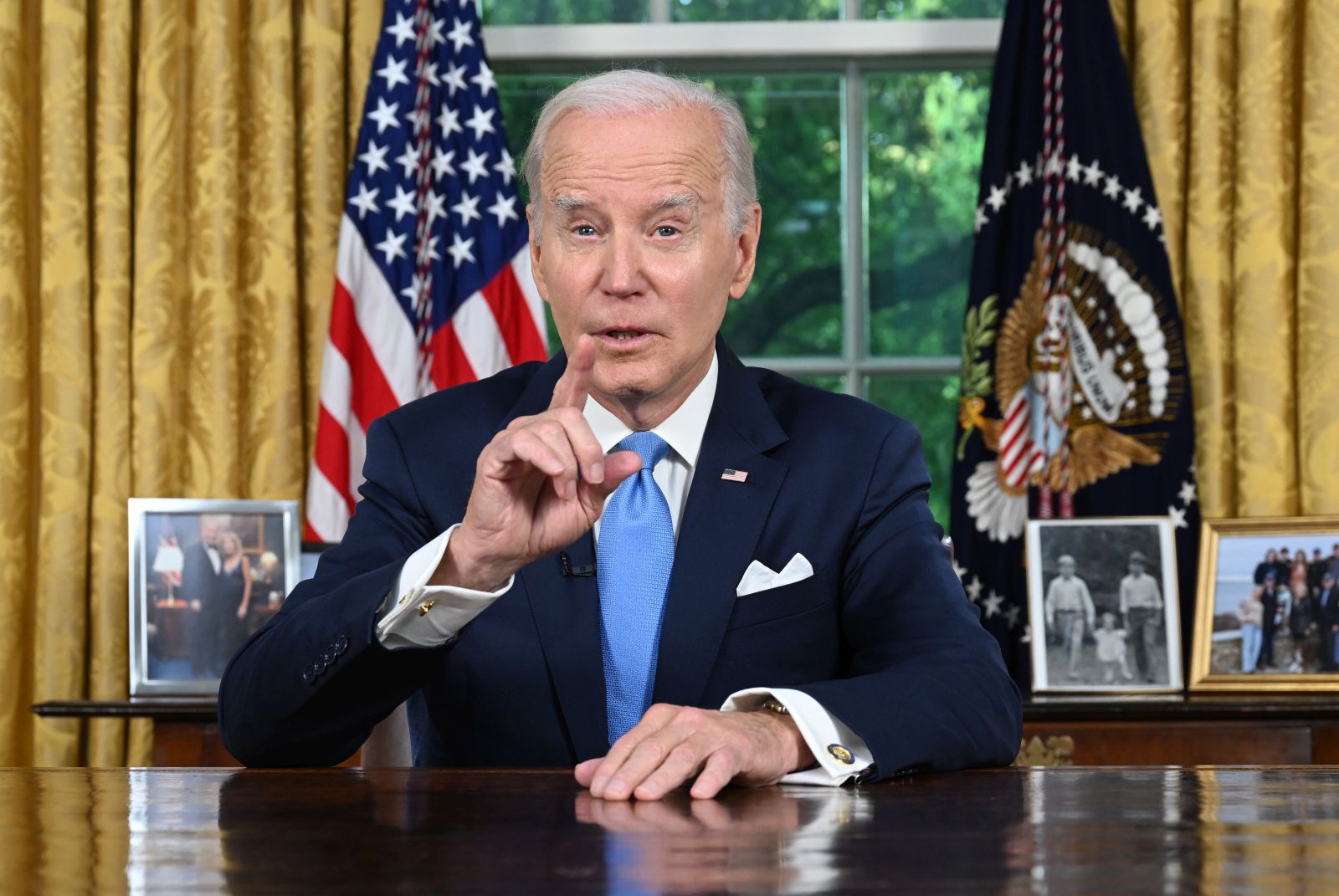 epa10669759 US President Joe Biden addresses the nation on averting default and the Bipartisan Budget Agreement, in the Oval Office of the White House in Washington, DC, USA, 02 June 2023. The Fiscal Responsibility Act of 2023 (FRA) (H.R. 3746), will suspend the US debt ceiling through 01 January 2025, and will avert a first-ever default by the US government.  EPA/JIM WATSON / POOL