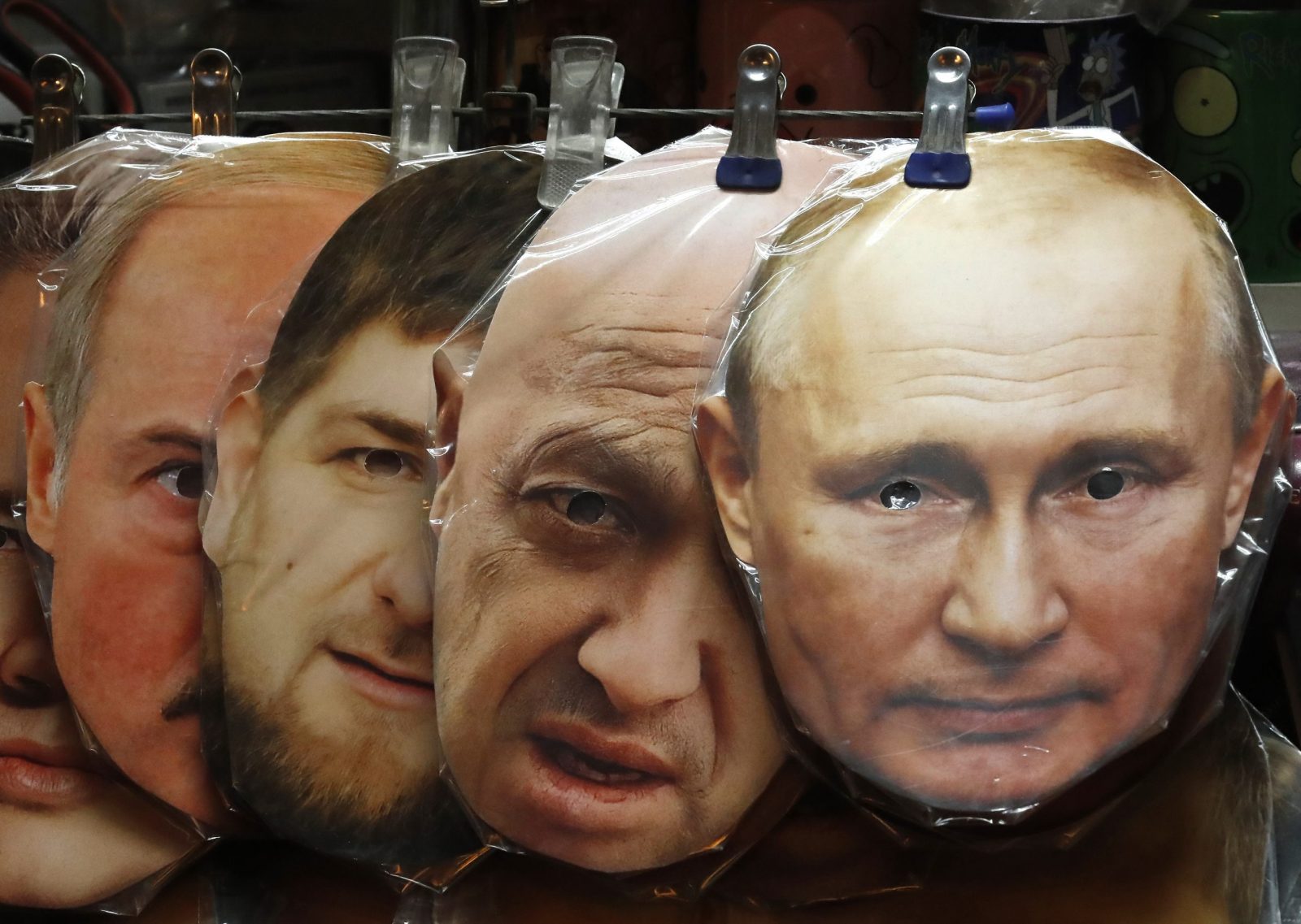 epa10674462 Face masks depicting (from-R) Russian President Vladimir Putin, owner of PMC (Private Military Company) Wagner Yeugeny Prigozhin, Chechen's regional leader Ramzan Kadyrov and Belarusian President Alexander Lukashenko are displayed for sale at a souvenir market in central St. Petersburg, Russia, 05 June 2023. On 24 February 2022 Russian troops entered the Ukrainian territory in what the Russian president declared a 'Special Military Operation', starting an armed conflict that has provoked destruction and a humanitarian crisis.  EPA/ANATOLY MALTSEV