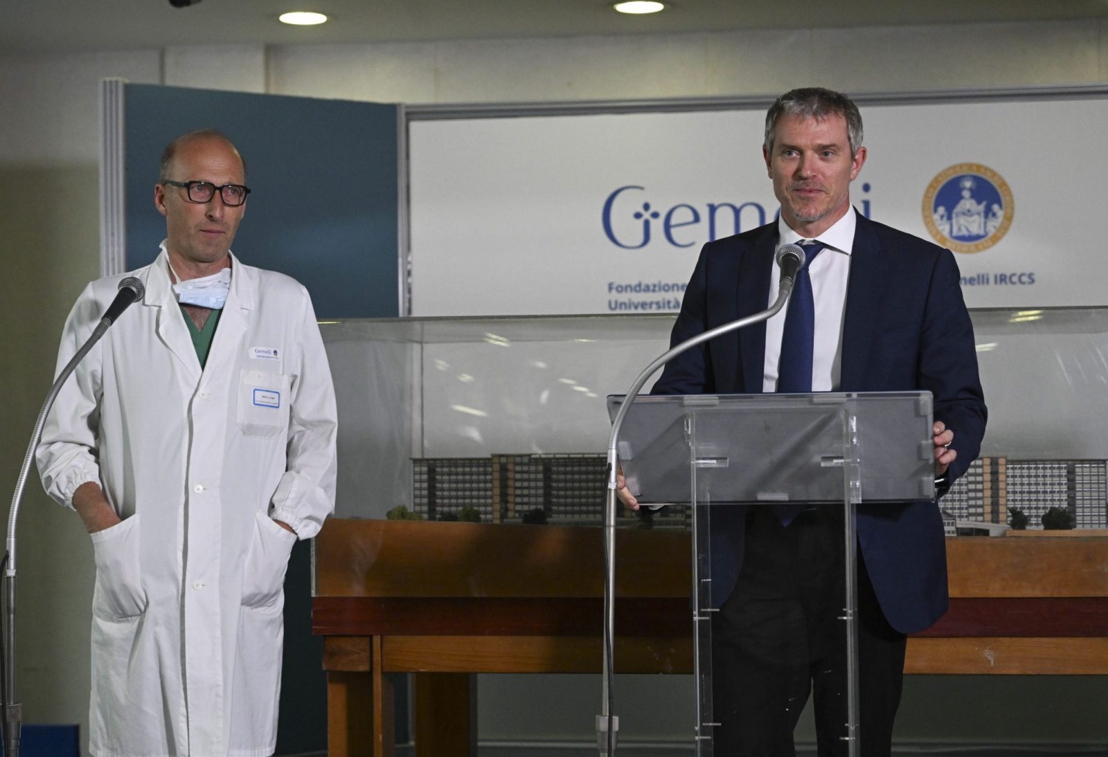 epa10678207 The director of the press office of the Holy See, Matteo Bruni (R), and  Sergio Alfieri, the surgeon who operated on Pope Francis, during the press conference at the Agostino Gemelli University Hospital, in Rome, Italy, 07 June 2023. Alfieri who operated on Pope Francis for an abdominal hernia said after the successful operation that the pontiff has no other diseases.  EPA/MAURIZIO BRAMBATTI