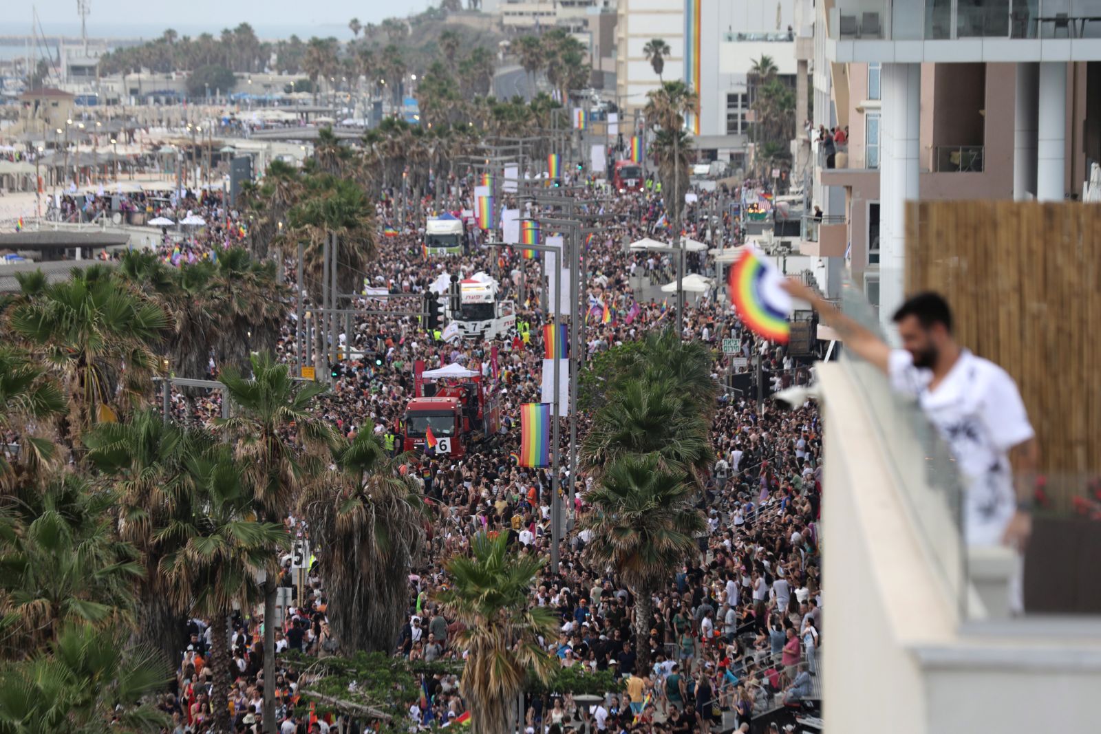 epa10680017 Participants march during the annual Gay Pride parade in Tel Aviv, Israel, 08 June 2023. This year Tel Aviv municipality marks 25 years since the first Pride parade in 1998 and expects hundreds of thousands to take part in the Pride events.  EPA/ABIR SULTAN
