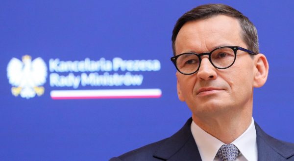 epa10681184 Polish Prime Minister Mateusz Morawiecki looks on as he attends a press conference at the Chancellery of the Prime Minister in Warsaw, Poland, 09 June 2023. The Polish Prime Minister has said Poland will not agree to the EU's latest migrant relocation scheme and will not pay for migrants it refuses to admit. The government's position on migration will remain unchanged, he added.  EPA/PAWEL SUPERNAK POLAND OUT