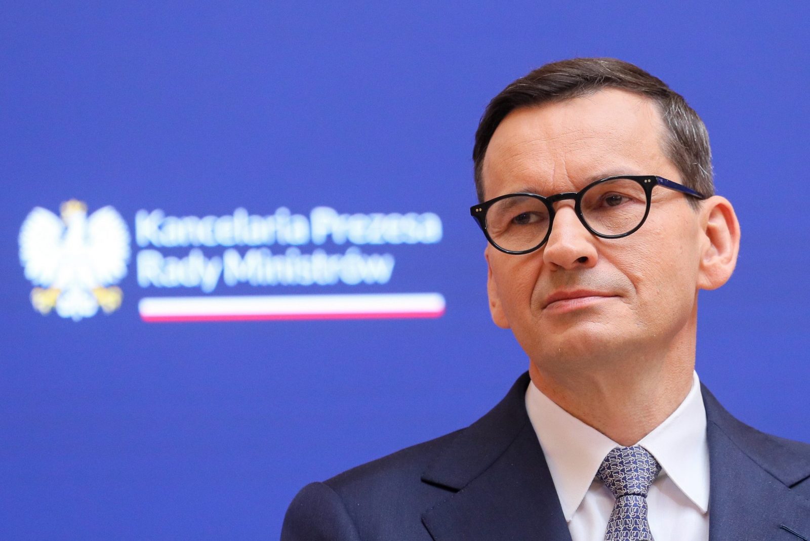 epa10681184 Polish Prime Minister Mateusz Morawiecki looks on as he attends a press conference at the Chancellery of the Prime Minister in Warsaw, Poland, 09 June 2023. The Polish Prime Minister has said Poland will not agree to the EU's latest migrant relocation scheme and will not pay for migrants it refuses to admit. The government's position on migration will remain unchanged, he added.  EPA/PAWEL SUPERNAK POLAND OUT
