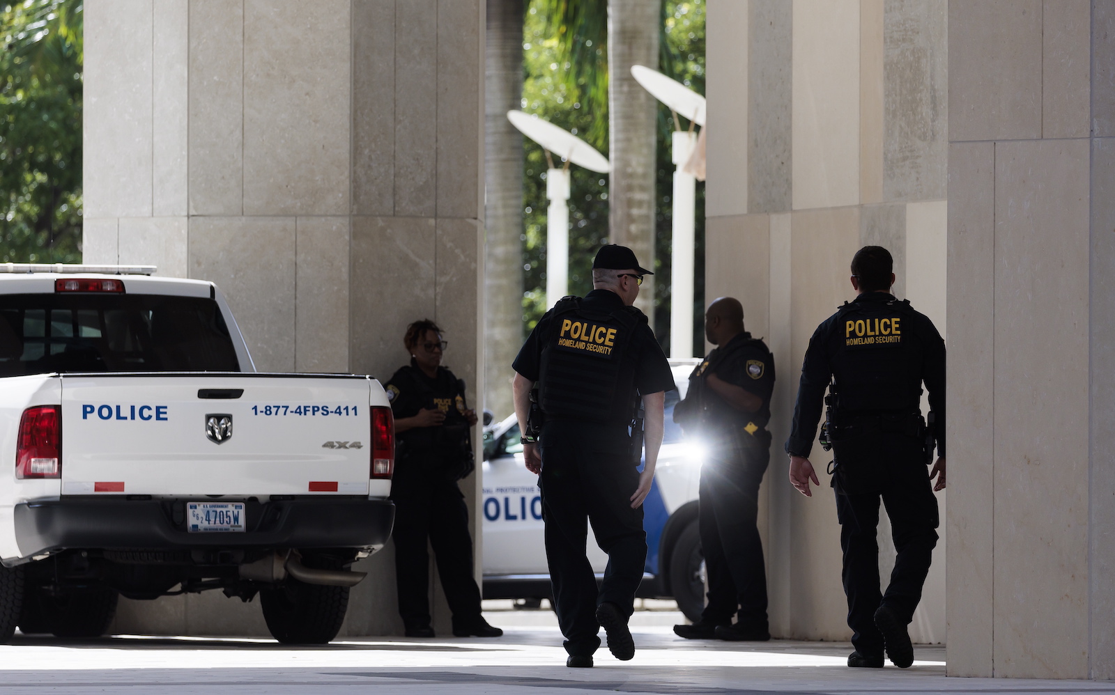 epa10688596 Police officers outside of the Wilkie D. Ferguson United States Courthouse where former President Donald Trump is scheduled to surrender today federal authorities in Miami, Florida, USA, 13 June 2023. Trump is facing multiple federal charges stemming from an US Justice Department investigation lead by Special Counsel Jack Smith related to Trumpâ€™s alleged mishandling of classified national security documents.  EPA/JUSTIN LANE