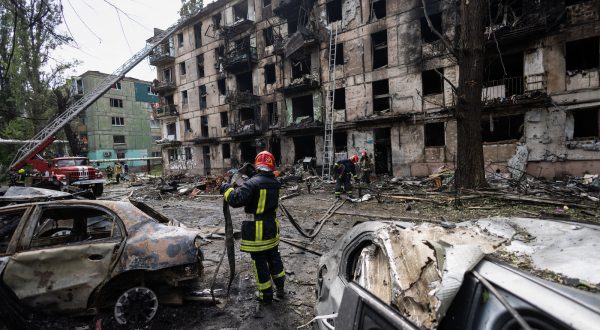 epa10688433 Rescuers at the scene of an apartment block, hit by a Russian missile, in Kryvy Rih, Dnipropetrovsk region, Ukraine, 13 June 2023. At least three people were killed and 25 others were wounded in an overnight Russian missile strike on a five-story apartment building in the city of Kryviy Rih in Ukraine's Dnipropetrovsk region, according to Mayor Oleksandr Vilkul. Russian troops entered Ukraine on 24 February 2022 starting a conflict that has provoked destruction and a humanitarian crisis.  EPA/STAS KOZLIUK