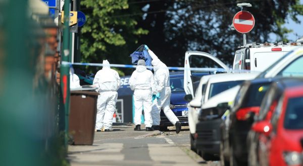 epa10688668 Police forensic officers remove an item from a van that was found on Bentinck Road in Nottingham, Britain, 13 June 2023. Three people were found dead following what police describe as an 'horrific and tragic incident'. A 31-year-old man was arrested on suspicion of murder. Another three people are in hospital after someone tried to run them over in a van. Police believe the incidents are connected.  EPA/LINDSEY PARNABY
