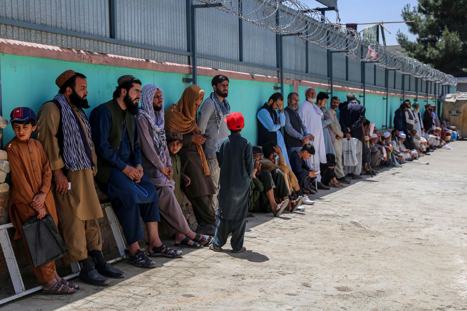 epa10688731 People line up to get free eye treatment in Kabul, Afghanistan, 13 June 2023. Pakistani doctors have started providing free eye treatments and surgeries for 800,000 patients suffering from eye diseases in Kabul and Kandahar. The initiative is carried out in cooperation with the Afghan Red Crescent, the King Salman Charity Foundation, and the Basar Charity Foundation. Specialist doctors from Karachi, Pakistan, are performing the operations using new technology and equipments. The initiative has been welcomed by patients, who are requesting that it be extended to other provinces. Afghanistan is known to have a high incidence of eye diseases due to environmental problems, and health officials are urging residents to take care of their eye health.  EPA/SAMIULLAH POPAL