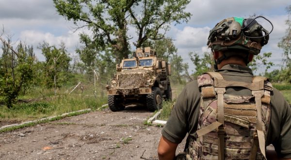 epa10696721 Ukrainian serviceman of the 688th Separate Jager Infantry Brigade 'Oleksa Dovbush' moves to the APC in the recently recaptured village of Blahodatne, Donetsk region, Ukraine, 17 June 2023. Russian troops entered Ukraine in February 2022 starting a conflict that has provoked destruction and a humanitarian crisis.  EPA/STRINGER