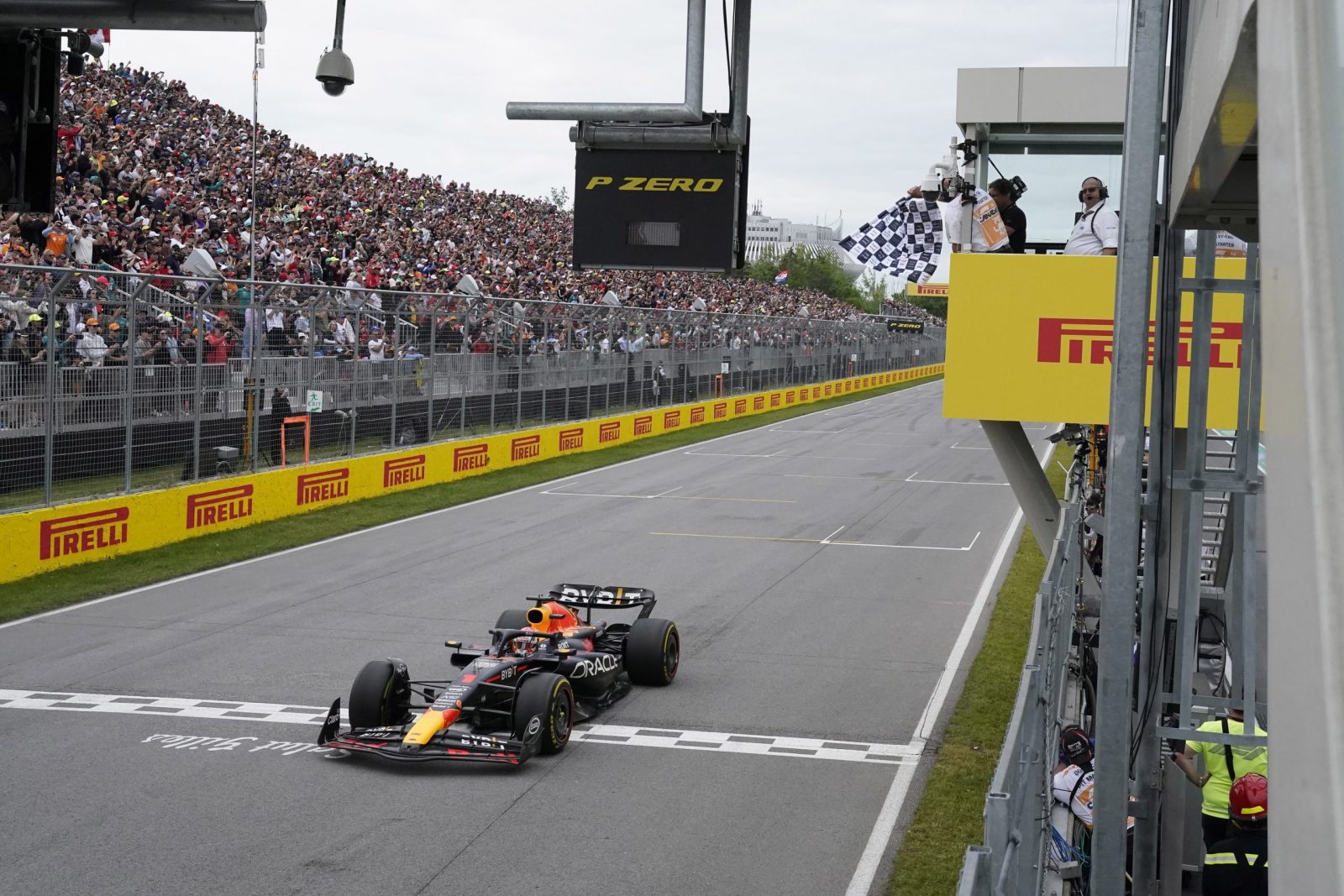 epa10698915 Dutch Formula One driver Max Verstappen of Red Bull Racing crosses the finishing line and wins the Formula 1 Grand Prix of Canada, at the Circuit Gilles-Villeneuve race track in Montreal, Canada, 18 June 2023.  EPA/TIMOTHY A. CLARY / POOL