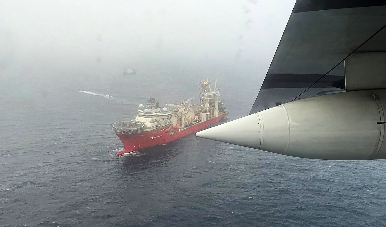 epa10703973 A handout photo made released by the US Coast Guard showing the Bahamanian research vessel 'Deep Energy' on site during the ongoing search for the 21-foot submersible Titan, in Boston, Massachusetts, USA, 21 June 2023. The United States Coast Guard, along with Canadian authorities, is searching the ocean depths for a submersible with Ocean Gate Expeditions, carrying tourists visiting the Titanic wreckage, 900 miles (1500 km) off the coast of Cape Cod, that lost contact on 18 June 2023.  EPA/US COAST GUARD HANDOUT  HANDOUT EDITORIAL USE ONLY/NO SALES