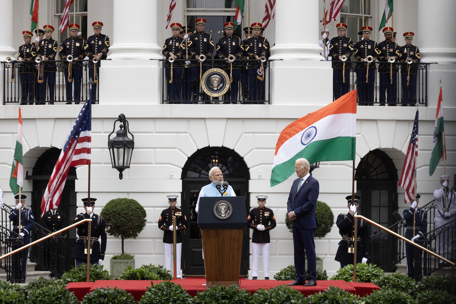 epa10706094 Prime Minister of India Narendra Modi (L) speaks beside US President Joe Biden (R) during an official welcome ceremony on the South Lawn of the White House in Washington, DC, USA, 22 June 2023. Biden hosts Modi for a state visit, during which they will discuss a variety of issues ranging from security in the Indo-Pacific, technology partnership and climate change.  EPA/MICHAEL REYNOLDS