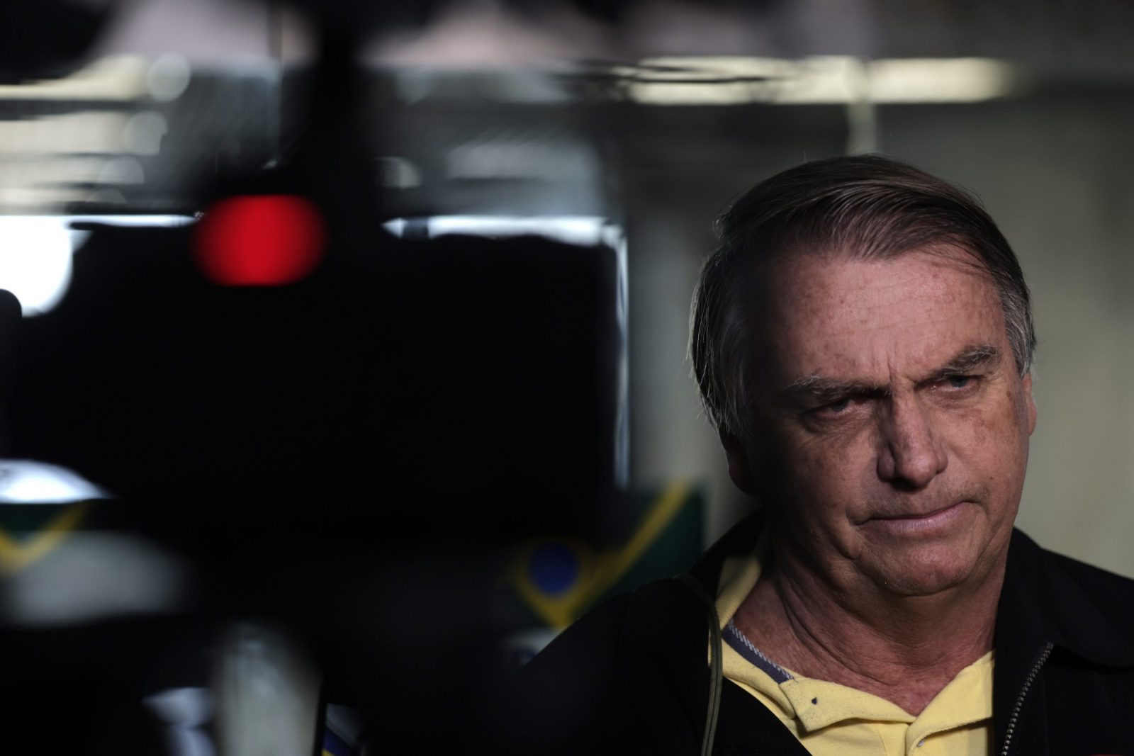 epa10717569 The former president of Brazil, Jair Bolsonaro, arrives at Santos Dumont airport, in Rio de Janeiro, Brazil 29 June 2023. The Superior Electoral Tribunal (TSE) on 29 June resumed the trial against former Brazilian President Jair Bolsonaro for 'abuse of political power' in the 2022 elections, which could leave the ultra-right leader ineligible in Brazil until 2030.  EPA/Antonio Lacerda