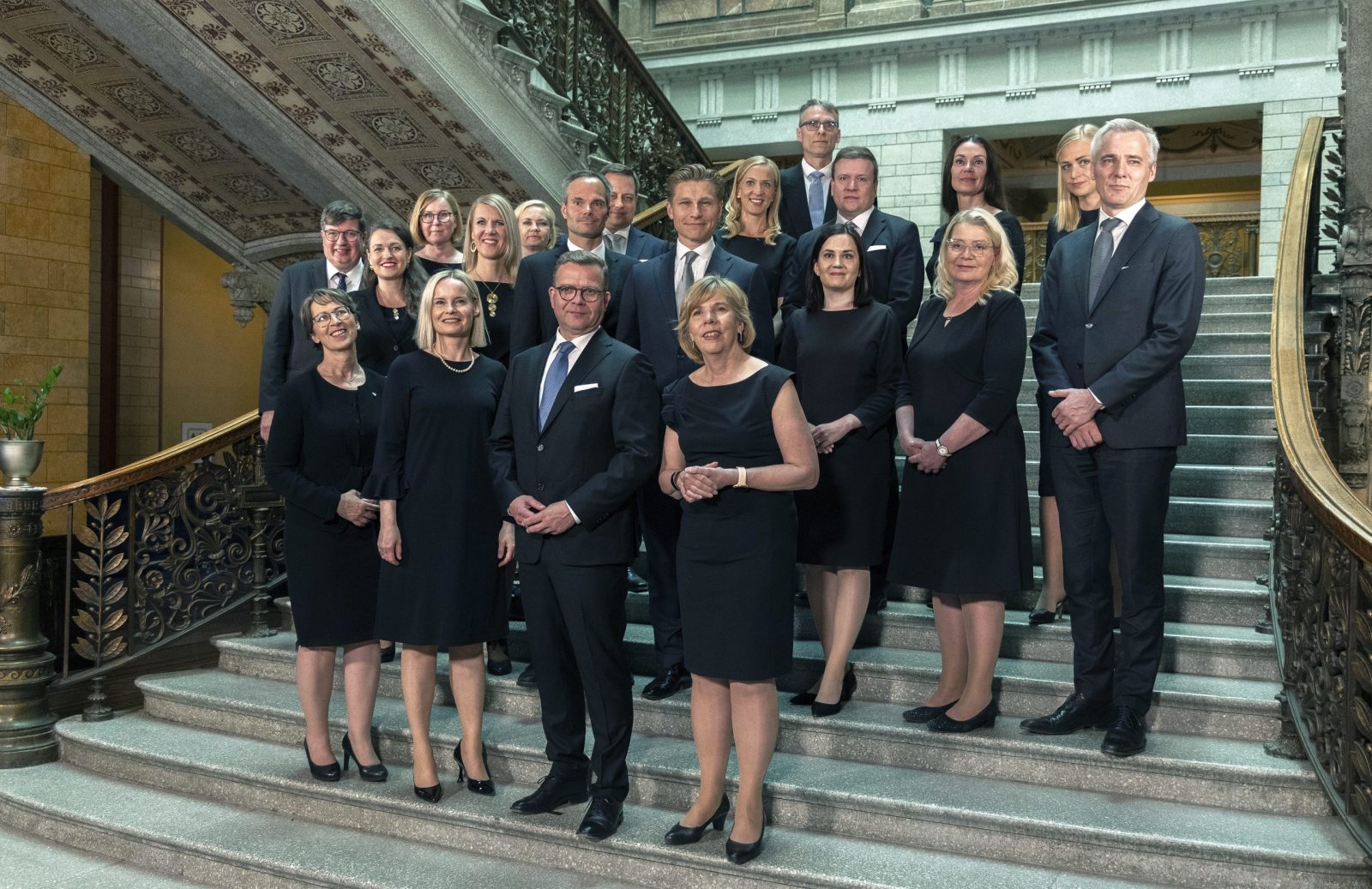 epa10701948 (Front row) New Finland’s Prime Minister Petteri Orpo (2R) with his new government’s ministers Agriculture and Forestry Sari Essayah (L), Finance Riikka Purra (2L) and Justice Anna-Maja Henriksson (R) and other pose for a family photo in Helsinki, Finland, 20 June 2023. The President of the Republic appointed Finland’s 77th Government, led by Prime Minister Petteri Orpo with 19 ministers.  EPA/MAURI RATILAINEN