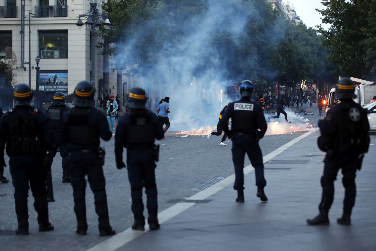 epa10719842 Riot police during clashes after a  demonstration in memory of 17-year-old Nahel who was killed by French Police in Marseille, France, 30 June 2023. Violence broke out all over France after police fatally shot a 17-year-old teenager during a traffic stop in Nanterre on 27 June.  EPA/Sebastien Nogier