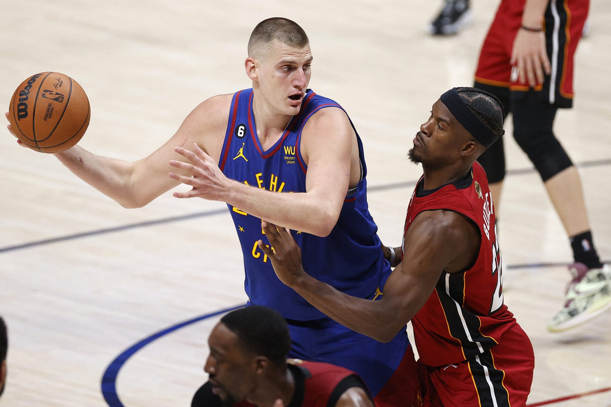 Jun 1, 2023; Denver, CO, USA; Denver Nuggets center Nikola Jokic (15) controls the ball while defended by Miami Heat forward Jimmy Butler (22) during the second quarter in game one of the 2023 NBA Finals at Ball Arena. Mandatory Credit: Isaiah J. Downing-USA TODAY Sports Photo: Isaiah J. Downing/REUTERS