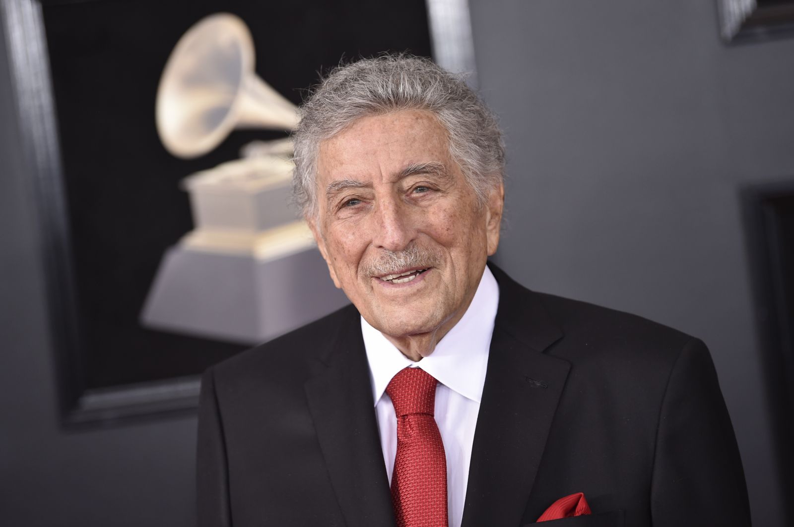 FILE - Tony Bennett arrives at the 60th annual Grammy Awards at Madison Square Garden on Sunday, Jan. 28, 2018, in New York. Bennett, the eminent and timeless stylist whose devotion to classic American songs and knack for creating new standards such as "I Left My Heart In San Francisco" graced a decadeslong career that brought him admirers from Frank Sinatra to Lady Gaga, died Friday, July 21, 2023. He was 96. (Photo by Evan Agostini/Invision/AP, File)