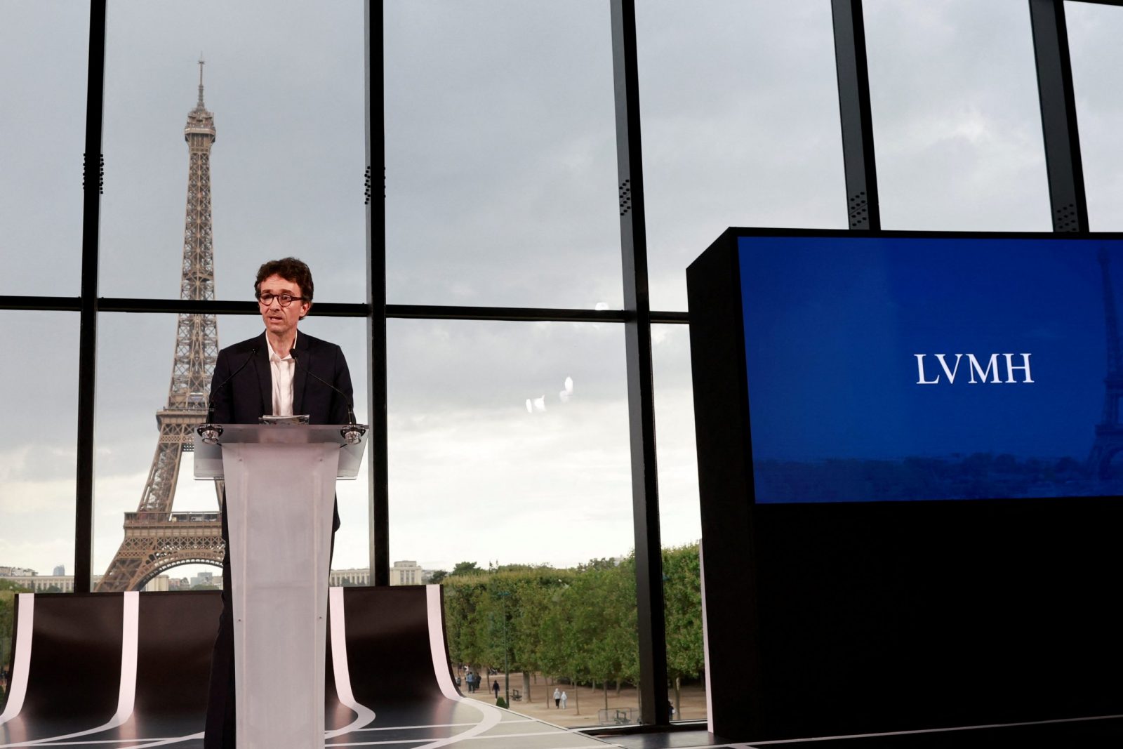 Antoine Arnault, Image Director of LVMH, speaks during a press conference to announce a LVMH sponsorship deal for the Paris 2024 Olympic Games at the Grand Palais Ephemere, with the Eiffel tower in the background, in Paris, France, July 24, 2023. REUTERS/Pascal Rossignol
