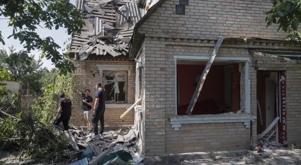 epa10695222 Residents inspect the damage to their home at the site hit by falling debris from a rocket, in Stari Petrivtsi village near Kyiv (Kiev), Ukraine, 16 June 2023, amid Russia's invasion. Ukraine Air Force reported 16 June, that Russia fired six Kh-47M2 Kinzhal, six Kalibr missiles and two reconnaissance drones on Kyiv. All air targets were shot down according to their report. As State Emergency Service reported, three private buildings were destroyed, 15 were damaged. At least three people were injured including one child. Russian troops entered Ukrainian territory in February 2022, starting a conflict that has provoked destruction and a humanitarian crisis.  EPA/SERGEY DOLZHENKO