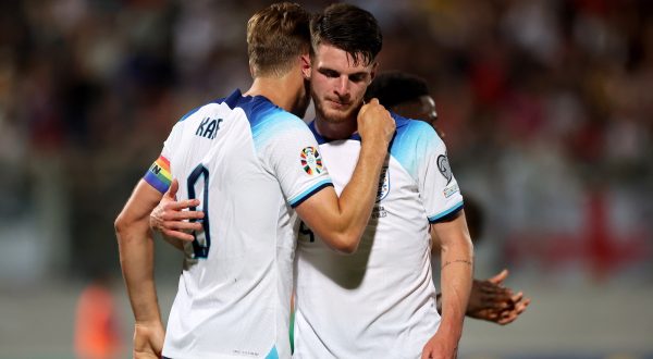epa10695719 England's Harry Kane (L) celebrates with Declan Rice (R) after scoring from the penalty spot during the UEFA European Qualifiers soccer match between Malta and England in Taâ€™ Qali, Malta, 16 June 2023.  EPA/Domenic Aquilina