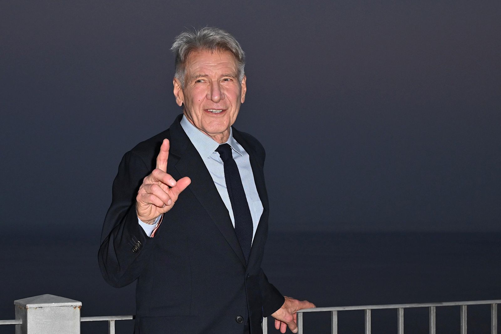 epa10711279 US actor Harrison Ford poses during a photo call for the movie 'Indiana Jones and the Dial of Destiny' during the 69th annual Taormina Film Festival, Sicily Island, Italy, 25 June 2023.  EPA/CARMELO IMBESI