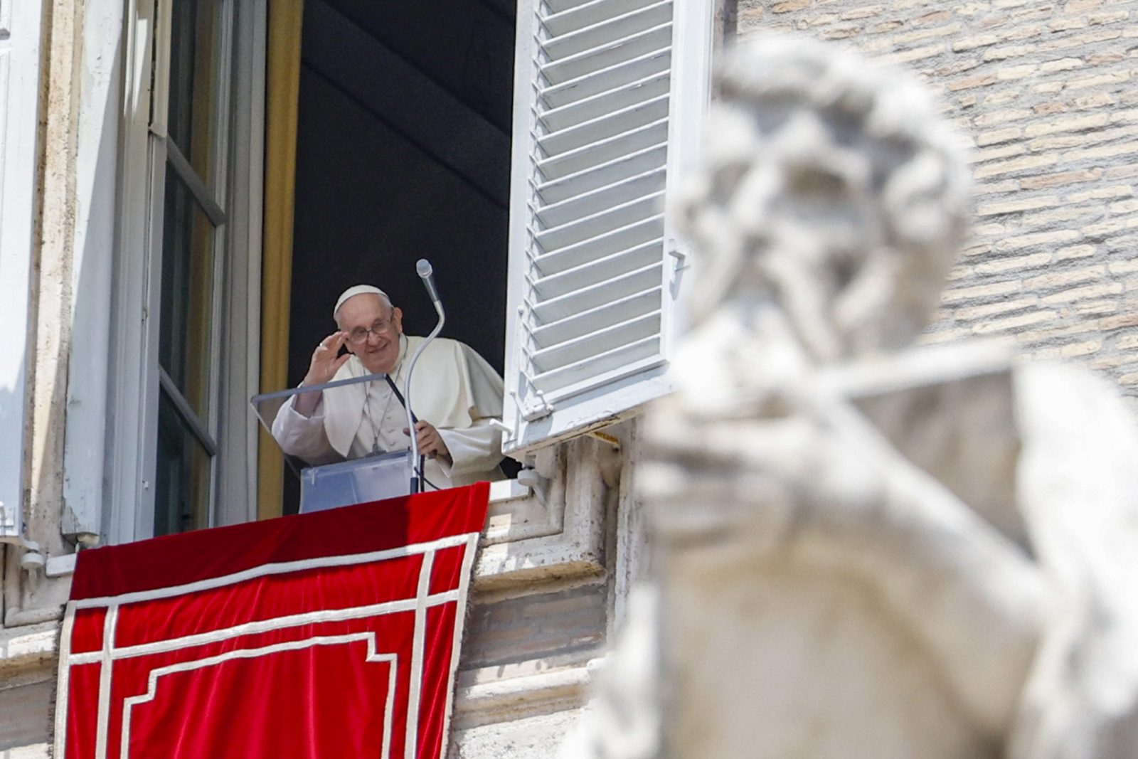 epa10722144 Pope Francis leads the Angelus prayer from the window of his office overlooking St. Peter's Square in Vatican City, 02 July 2023.  EPA/FABIO FRUSTACI
