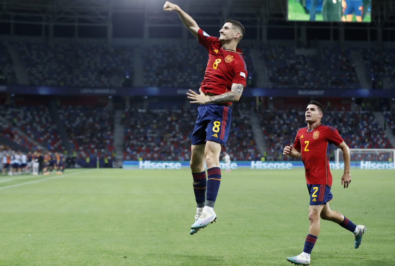 epa10728451 Spain's Oihan Sancet celebrates with teammates after scoring the 2-1 lead during the UEFA Under-21 Championship semi final match between Spain and Ukraine in Bucharest, Romania, 05 July 2023.  EPA/ROBERT GHEMENT