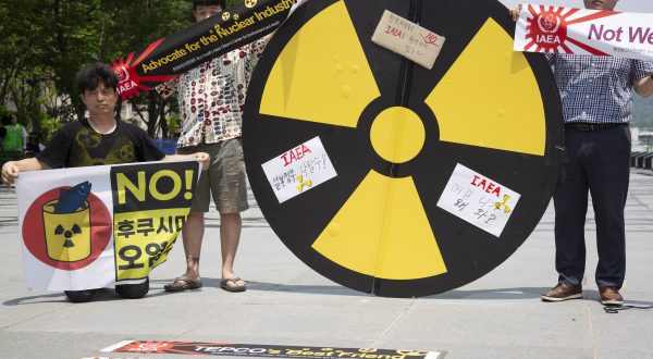 epa10728878 Members of an environmental group hold banners reading 'No Fukushima radioactive water' during a rally against the Internationsl Atomic Energy Agency's (IAEA) report on Japan's disposal of radioactive water; in Seoul, South Korea, 06 July 2023. According to the IAEA, Japan's plans to release treated water stored at the Fukushima Daiichi nuclear power station into the sea are consistent with IAEA Safety Standards and the discharge of the treated water would have a negligible radiological impact on people and the environment.  EPA/JEON HEON-KYUN