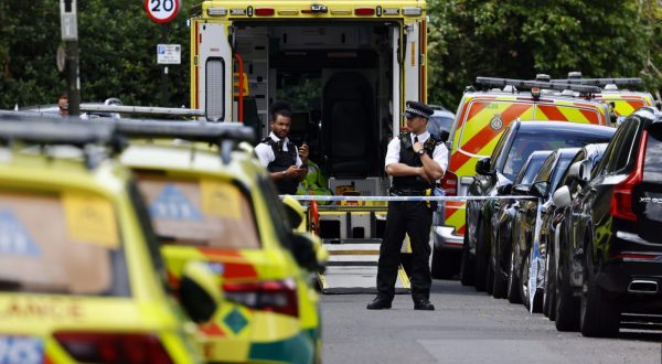 epa10729348 Emergency services work at the site where a car crashed into a primary school in Wimbledon, London, Britain, 06 July 2023. Police said several people were injured when a car drove into the primary school on Camp Road.  EPA/TOLGA AKMEN   EDITORIAL USE ONLY