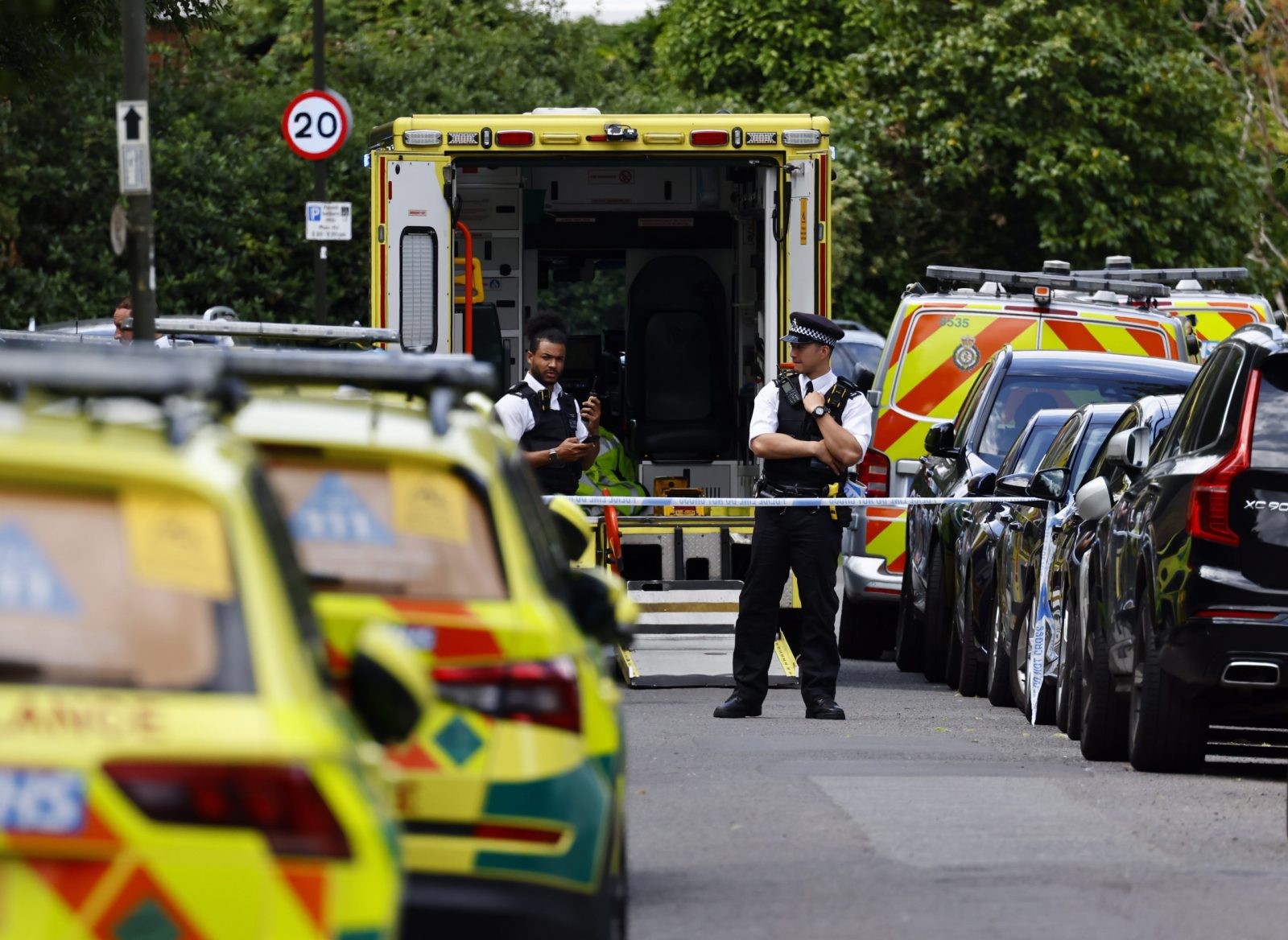 epa10729348 Emergency services work at the site where a car crashed into a primary school in Wimbledon, London, Britain, 06 July 2023. Police said several people were injured when a car drove into the primary school on Camp Road.  EPA/TOLGA AKMEN   EDITORIAL USE ONLY