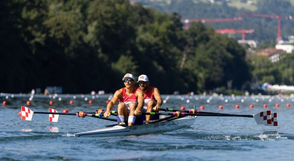 epa10731397 Martin Sinkovic and Valent Sinkovic of Croatia compete in the Men's Double Sculls heat on the first day of the 2023 World Rowing Cup at Rotsee lake in Lucerne, Switzerland 07 July 2023.  EPA/PHILIPP SCHMIDLI