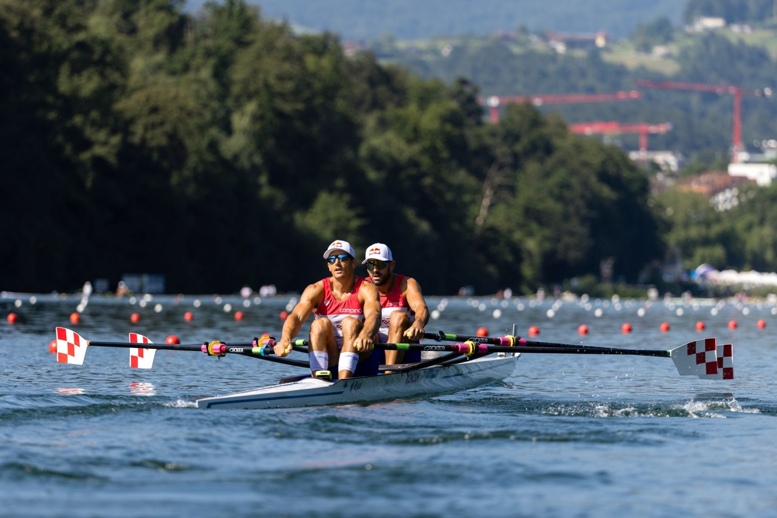 epa10731397 Martin Sinkovic and Valent Sinkovic of Croatia compete in the Men's Double Sculls heat on the first day of the 2023 World Rowing Cup at Rotsee lake in Lucerne, Switzerland 07 July 2023.  EPA/PHILIPP SCHMIDLI