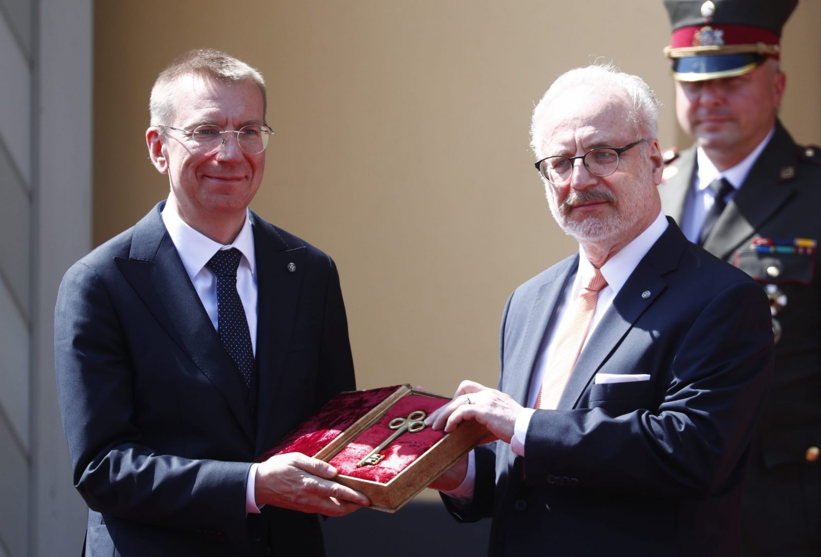 epa10733822 New Latvian President Edgars Rinkevics (L) and outgoing President Egils Levis attend the symbolic handover ceremony of the keys to Riga Castle, Latvia, 08 July 2023. Edgars Rinkevics, who was elected as the president, became the seventh president since the restoration of Latvia's independence.  EPA/TOMS KALNINS