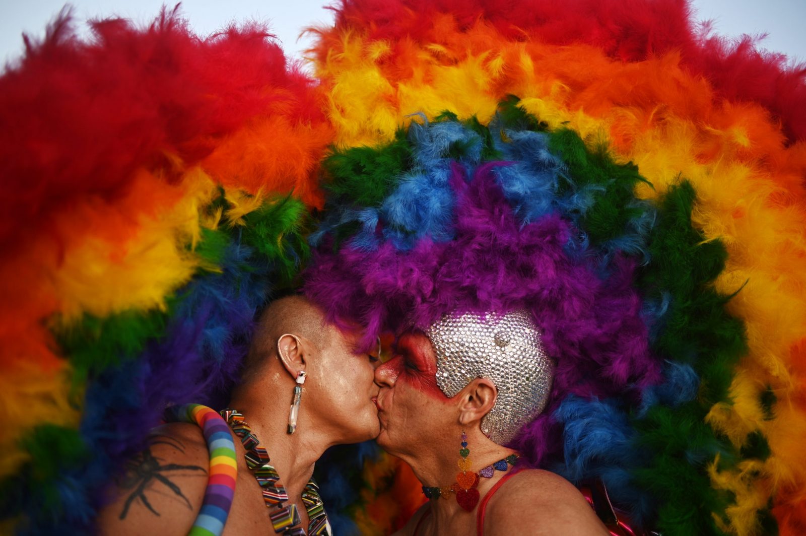 epaselect epa10736836 Two persons kiss during the 24th edition of the Brasilia LGBT+ Pride March, on the esplanade of the Ministries in Brasilia, Brazil, 09 July 2023. With the march towards the National Congress, the capital of Brazil ends its 2023 Pride festival, which began on June 24 and which developed recreational, cultural, and educational activities around diversity and the claim of rights of the LGBT+ community.  EPA/Andre Borges