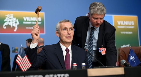 epa10739612 Secretary General of NATO Jens Stoltenberg holds a gavel during the meeting of the North Atlantic Council with Sweden at the NATO ​summit in Vilnius, Lithuania, 11 July 2023. The North Atlantic Treaty Organization (NATO) Summit takes place in Vilnius on 11 and 12 July 2023 with the alliance's leaders expected to adopt new defence plans.  EPA/FILIP SINGER