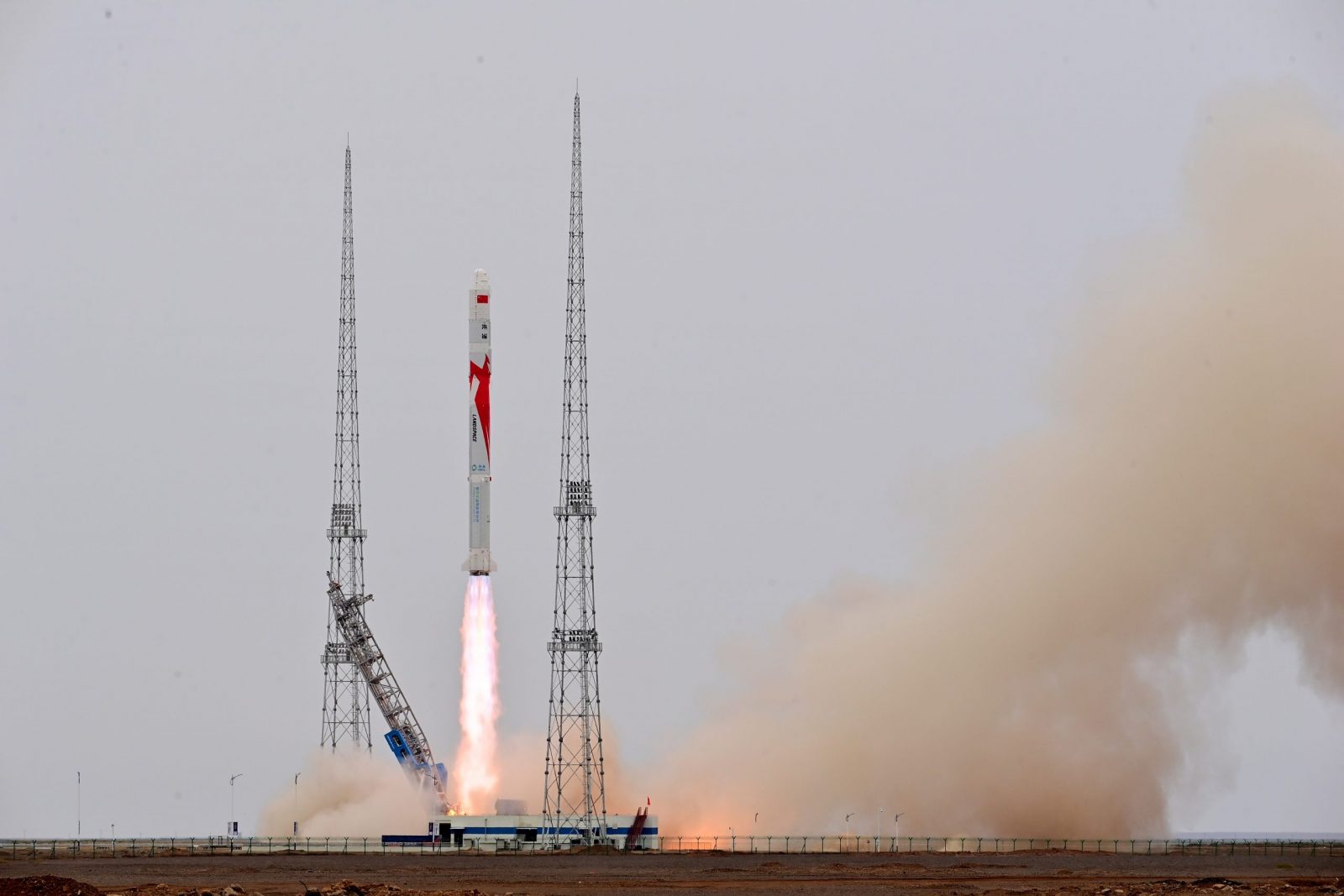 epa10742057 The Zhuque-2 carrier rocket blasts off from the Jiuquan Satellite Launch Center in northwest China, 12 July 2023. The carrier rocket completed the flight mission according to the procedure, making the launch successful.  EPA/XINHUA / WANG JIANGBO CHINA OUT / UK AND IRELAND OUT  /       MANDATORY CREDIT  EDITORIAL USE ONLY