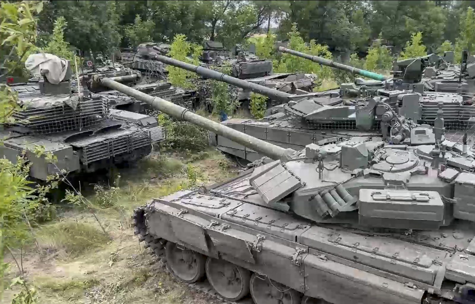 epa10742471 A handout photo made available by Russian Defence Ministry Press-Service shows Russian tanks handed over by the 'Wagner' Private Military Company (PMC) group to Russian troops and gathered at an unknown location in Russia, 12 July 2023. Russia's Defense Ministry reported that the acceptance of weapons and military equipment from units of the Wagner group is being completed. 'More than 2,000 pieces of equipment and weapons were transferred' the ministry said, adding that these included hundreds of pieces of heavy weapons such as T-90, T-80, T-72B3 tanks, Grad, Uragan multiple launch rocket systems, anti-aircraft missile and gun systems 'Pantsir'. More than 2,500 tons of various ammunition and about 20,000 small arms have also been received,' the ministry said.  EPA/RUSSIAN DEFENCE MINISTRY PRESS SERVICE HANDOUT -- BEST QUALITY AVAILABLE -- MANDATORY CREDIT -- HANDOUT EDITORIAL USE ONLY/NO SALES