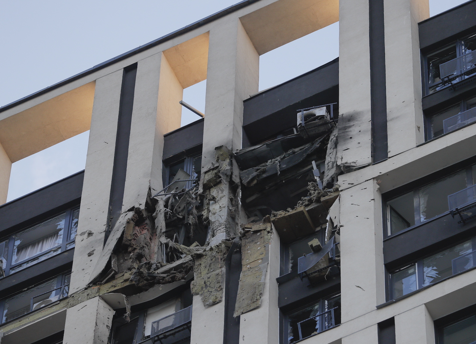 epa10743004 Exterior view of a damaged residential building after an overnight shock drones strike in Kyiv, Ukraine, 13 June 2023 amid the Russian invasion. At least two people were injured by falling drone debris, according to the State Emergency Service report. Russian forces launched an attack on Ukraine with a total of 20 shock drones, early 13 June, and all of them were shot down. At least 10 drones were directed at the Kyiv region, the Air Force Command of the Armed Forces of Ukraine said. The war in Ukraine which started when Russian troops entered Ukraine in February 2022, marked in July its 500th day. According to the UN more than 9,000 civilians have been killed since the war started.  EPA/SERGEY DOLZHENKO
