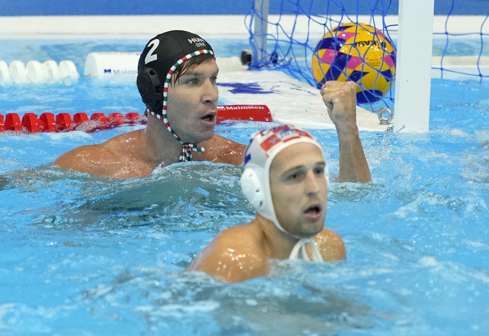 epa10754703 Daniel Angyal (L) of Hungary reacts after scoring a goal at the Men's Water Polo preliminary round match between Croatia and Hungary during the World Aquatics Championships 2023 in Fukuoka, Japan, 19 July 2023.  EPA/FRANCK ROBICHON