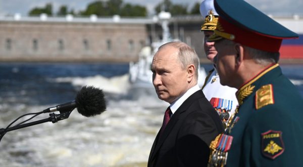 epa10776866 Russian President Vladimir Putin (L), Russian Defence Minister Sergei Shoigu (front R) and Russian Navy Commander-in-Chief Admiral Nikolai Yevmenov (back R) attend the Navy Day parade, in St. Petersburg, Russia, 30 July 2023. President Putin announced that the Russian navy will get 30 new ships this year, during his speech at the annual Navy Day Parade in St Petersburg. Russian Navy Day is celebrated annually on the last Sunday of July.  EPA/ALEXANDER KAZAKOV / SPUTNIK / KREMLIN POOL / POOL -- MANDATORY CREDIT--