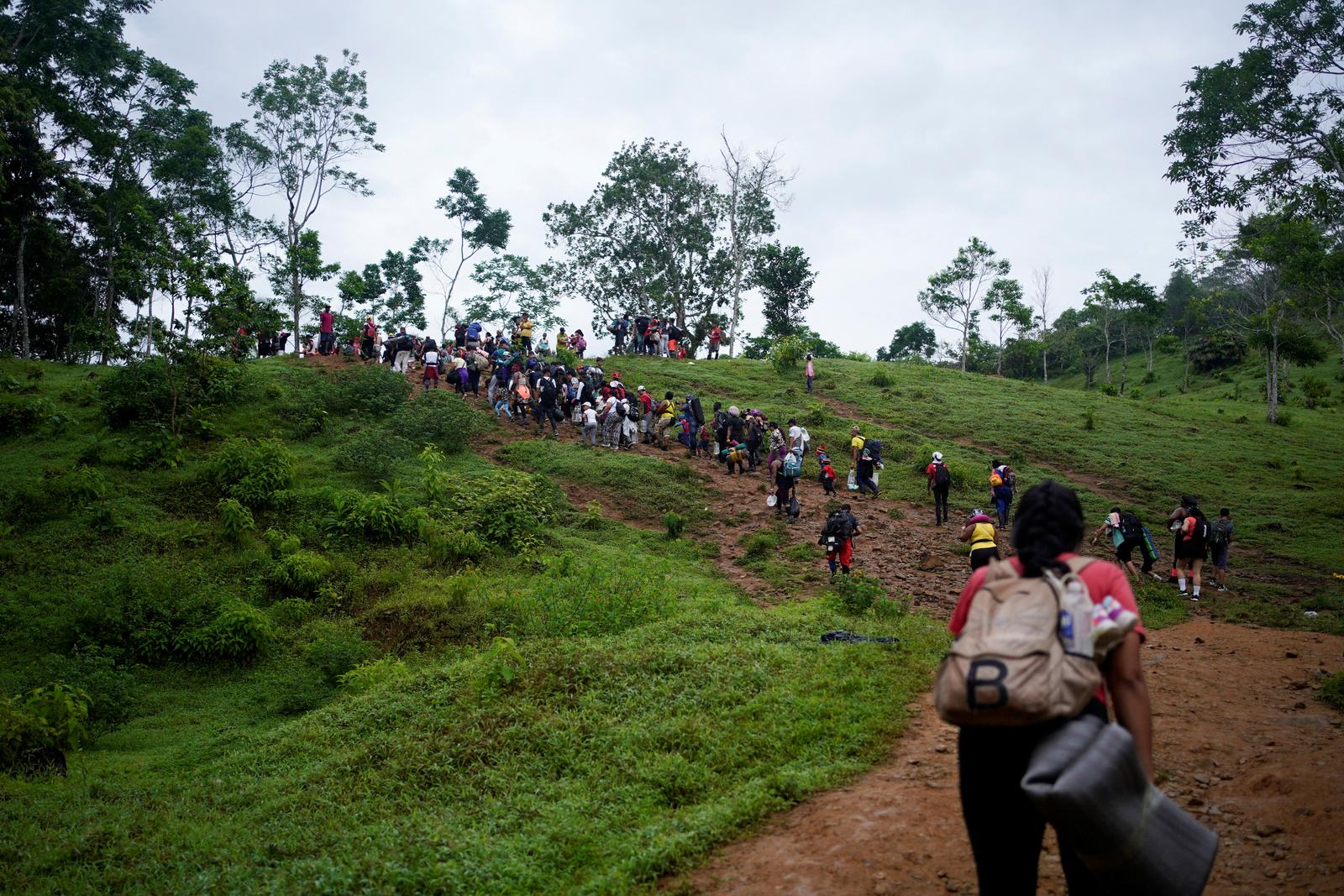 A group of migrants from different countries walk through the Darien Gap, as they continue their journey to the U.S. border, in Acandi, Colombia July 9, 2023. REUTERS/Adri Salido NO RESALES. NO ARCHIVES Photo: Stringer/REUTERS