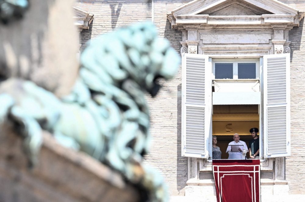 epa10763667 Pope Francis leads his Sunday Angelus prayer from a window overlooking the Saint Peter's Square, in Vatican City, 23 July 2023.  EPA/CLAUDIO PERI