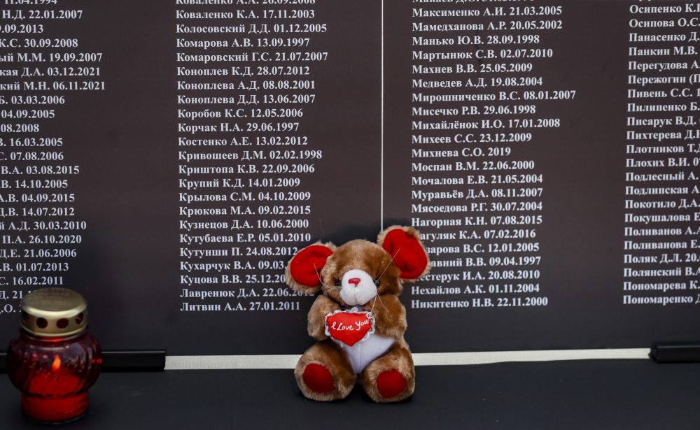 epa10771406 A candle a toy are placed near the list of children who died in the Donbas territory since 2014, during an event in their memory, in front of the US embassy in Moscow, Russia, 27 July 2023. On 27 July, the self-procalimed Donetsk People's Republic celebrates the Day of Remembrance of the Children Victims of the War in Donbass. According to its Commissioner for Human Rights Darya Morozova, as of 20 July 2023, some 228 children died in the territory of Donbass during the entire period of the armed conflict  EPA/YURI KOCHETKOV
