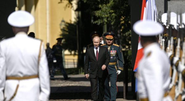 epa10776824 Russian President Vladimir Putin (C-L) and Russian Defence Minister Sergei Shoigu (C-R) arrive to attend the Navy Day parade, in St. Petersburg, Russia, 30 July 2023. President Putin announced that the Russian navy will get 30 new ships this year, during his speech at the annual Navy Day Parade in St Petersburg. Russian Navy Day is celebrated annually on the last Sunday of July.  EPA/ALEXEY DANICHEV / SPUTNIK / KREMLIN POOL / POOL -- MANDATORY CREDIT--