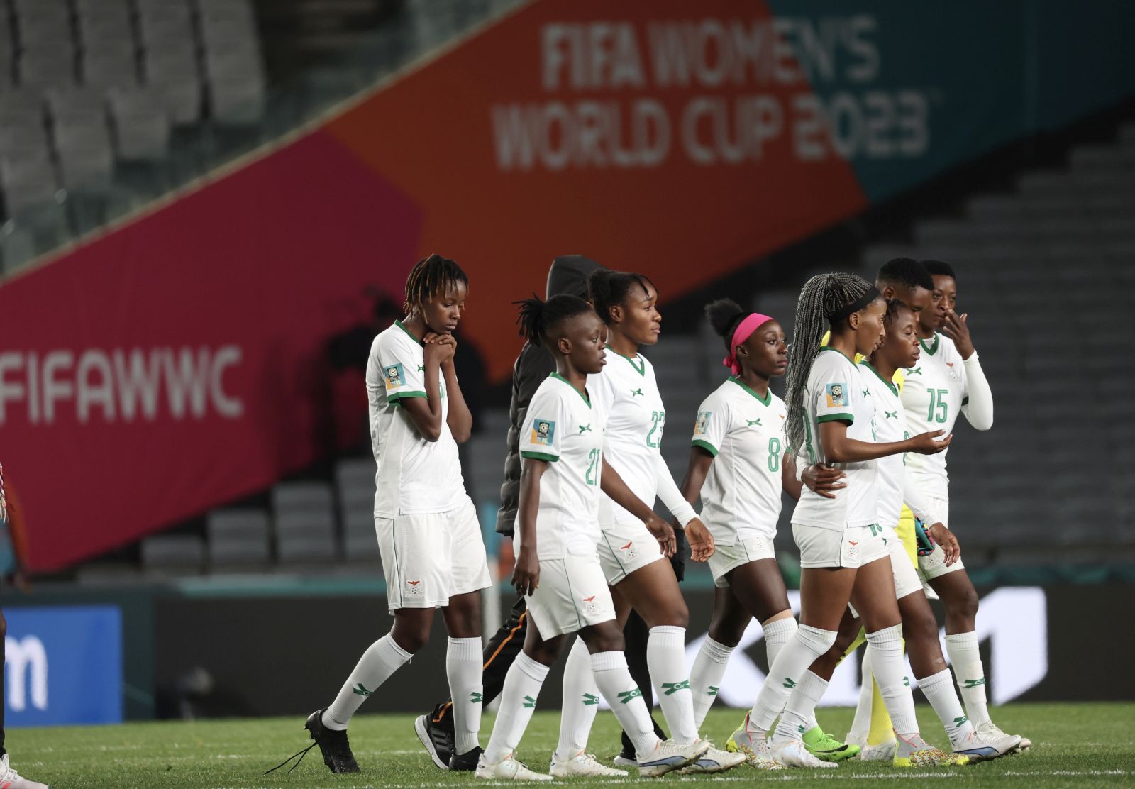 epa10769114 Zambia players walk off the pitch dejected after losing the FIFA Women's World Cup group C soccer match between Spain and Zambia, in Auckland, New Zealand, 26 July 2023.  EPA/HOW HWEE YOUNG