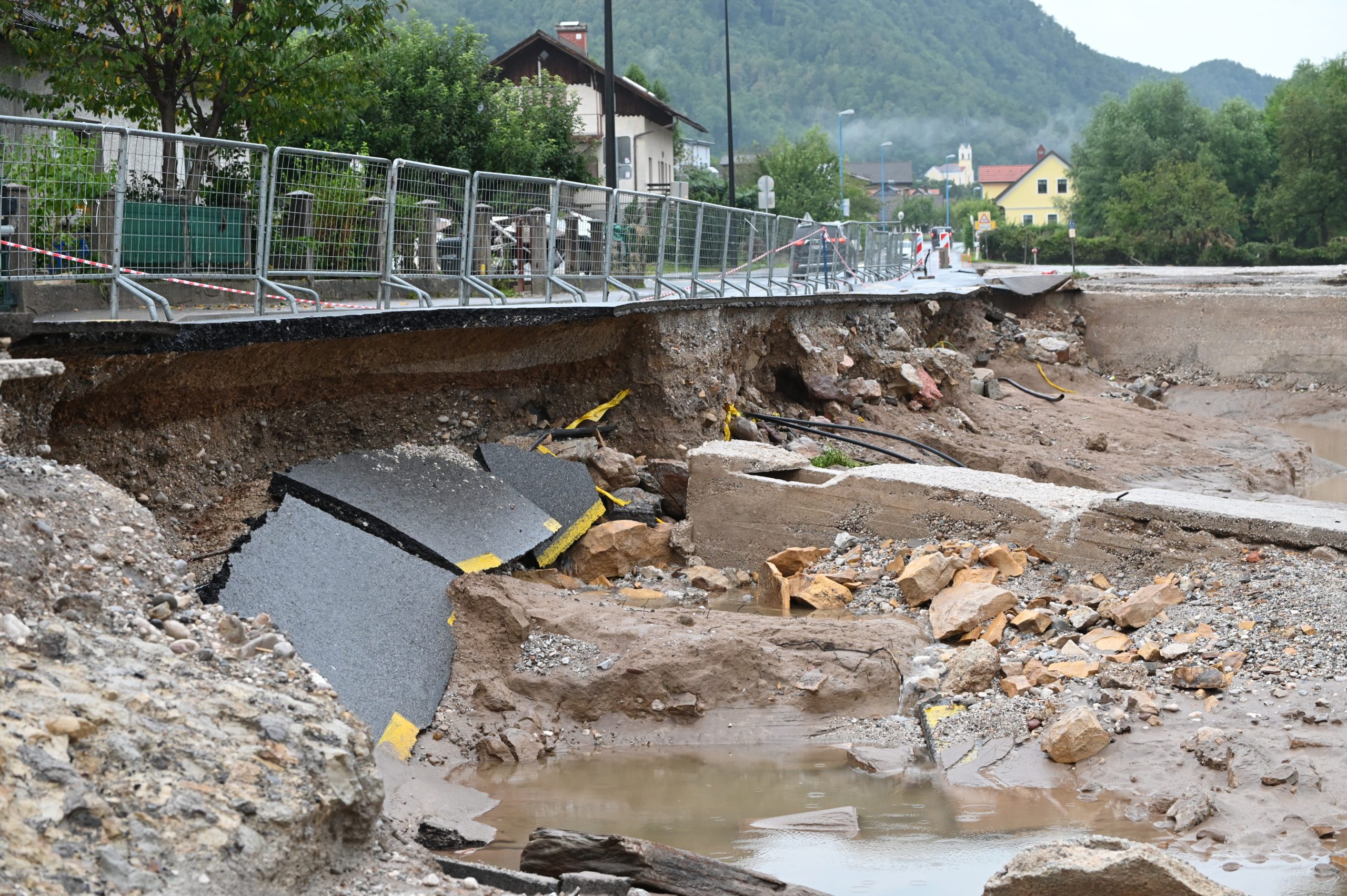 epa10787118 A view on a collapsed bridge near Skofja Loka town in Slovenia, 06 August 2023. Slovenia has been hit by flash floods following heavy torrential rains on 04 August. The country has faced the biggest natural disaster in its history‘ said Slovenian Prime Minister Robert Golob on 05 August. Slovenian Government estimated the damage of roads, energy infrastructure, as well as hundreds of homes is likely to exceed 500 million euros.  EPA/ZIGA ZIVULOVIC JR