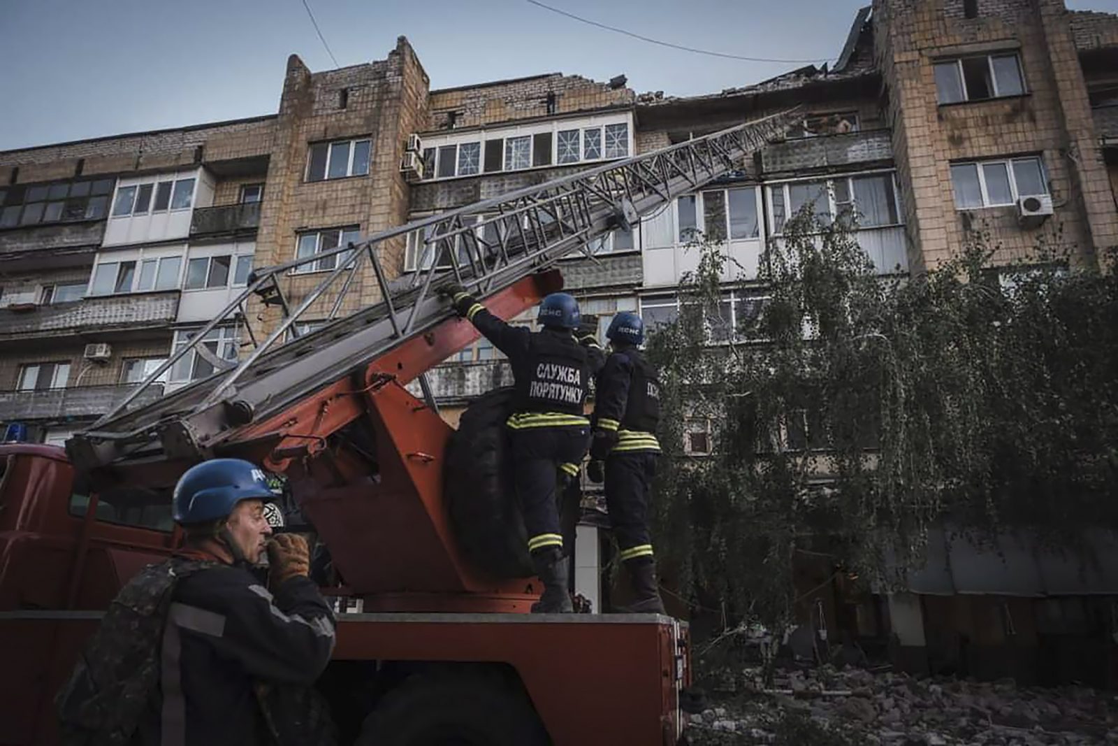epa10789589 A handout photo made available by the State Emergency Service shows Ukrainian rescuers working on a site where a rocket hit the city of Pokrovsk, Donetsk area, Ukraine, 07 August 2023, amid the Russian invasion. At least five people died and 31 were injured after two rockets hit a residential building and a hotel downtown, according to a National Police report. Russian troops entered Ukrainian territory in February 2022, starting a conflict that has provoked destruction and a humanitarian crisis.  EPA/STATE EMERGENCY SERVICE HANDOUT HANDOUT  HANDOUT EDITORIAL USE ONLY/NO SALES