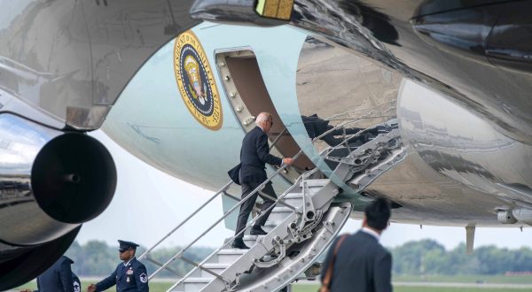 epa10789705 US President Joe Biden (C) boards Air Force One in route to Grand Canyon Village, Arizona at Joint Base Andrews in Prince Georgeâ€™s County, Maryland, 07 August 2023.  EPA/BONNIE CASH / POOL