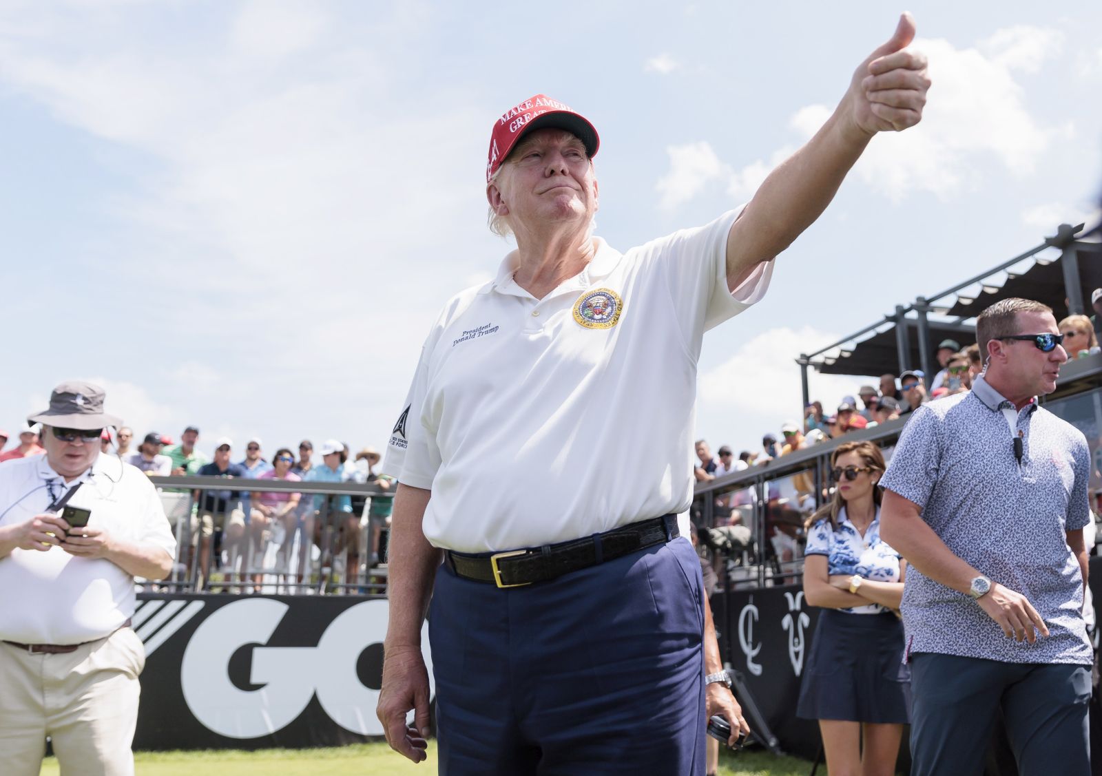 epa10795749 Former US President Donald J. Trump on the first tee at the start of the first round of the LIV Golf tournament at Trump National Golf Club Bedminster in Bedminster, New Jersey, USA, 11 August 2023.  EPA/JUSTIN LANE