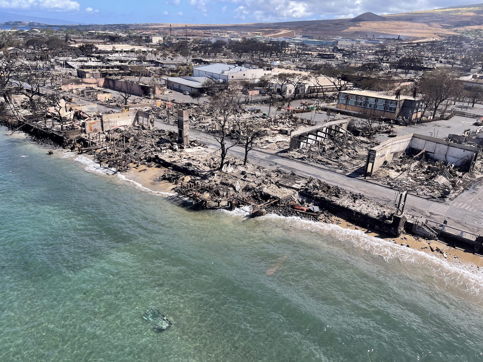 epa10797705 A handout photo made available by the Hawaii Department of Department of Land and Natural Resources shows an aerial view of the wildfire aftermath in Lahaina on Maui, Hawaii, on 11 August 2023 (issued 12 August 2023). Officials have said at least 80 people have died in the wildfires on Maui, Hawaii.  EPA/HAWAII DEPARTMENT OF LAND AND NATURAL RESOURCES HANDOUT . HANDOUT EDITORIAL USE ONLY/NO SALES